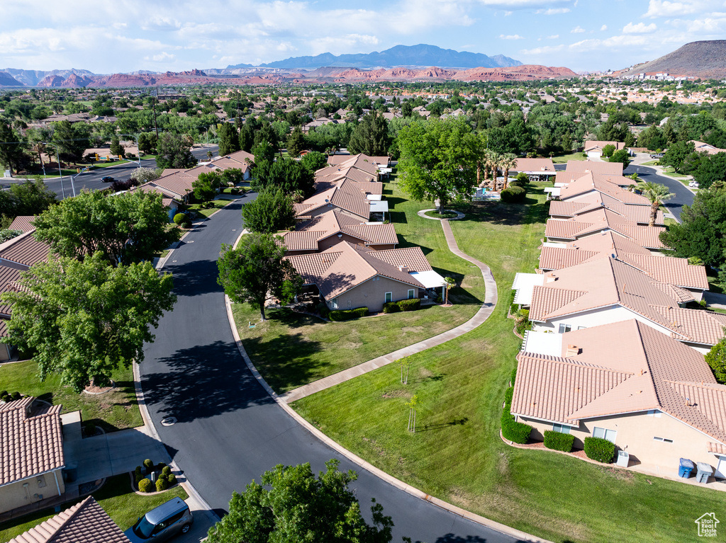 Aerial view of residential area with a mountainous background