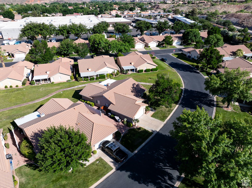 Aerial overview of property's location featuring nearby suburban area