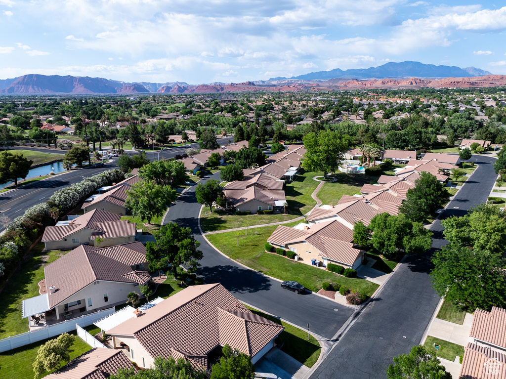 Aerial view of residential area with mountains
