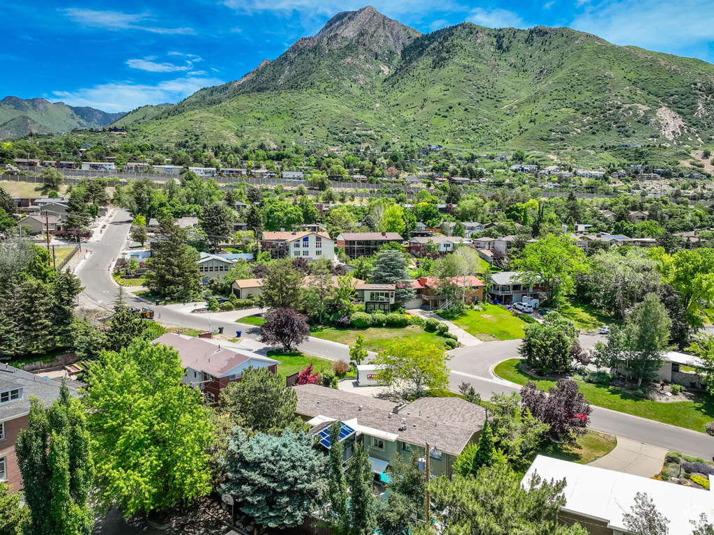 Aerial view of residential area with a mountain backdrop