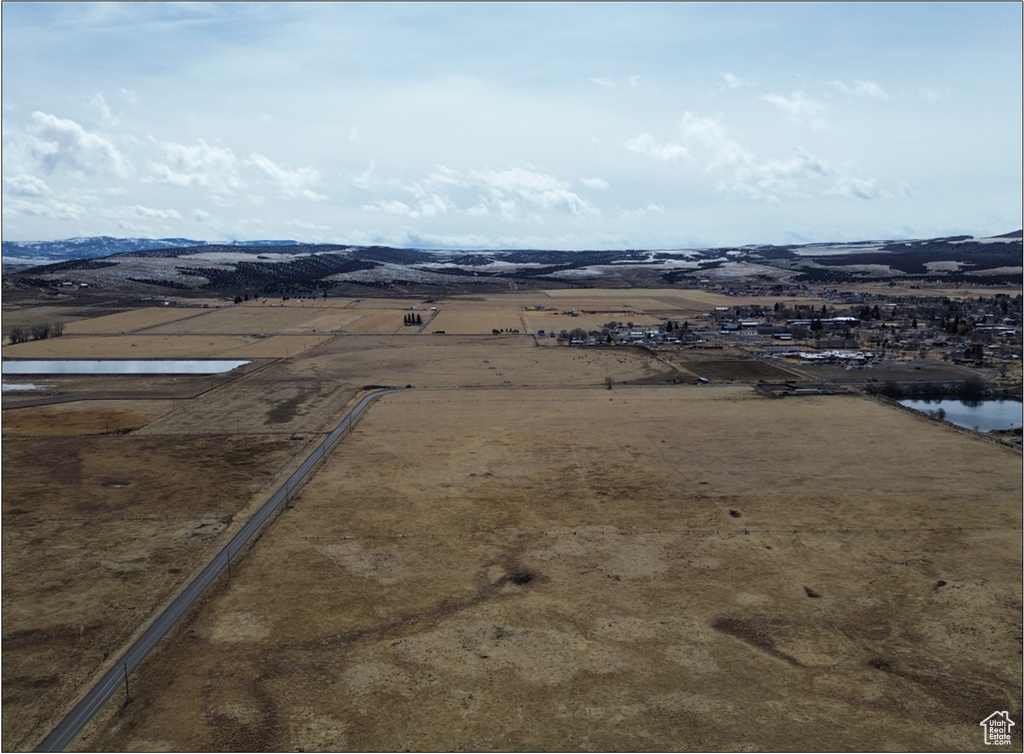 Aerial view of sparsely populated area with a nearby body of water