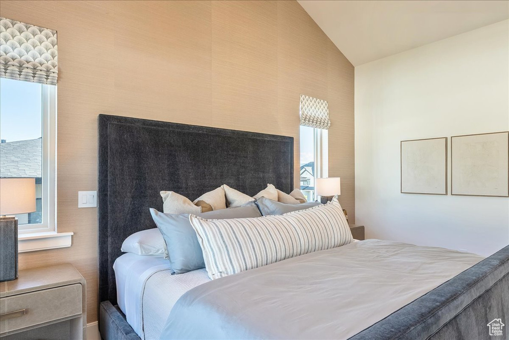 Bedroom with vaulted ceiling