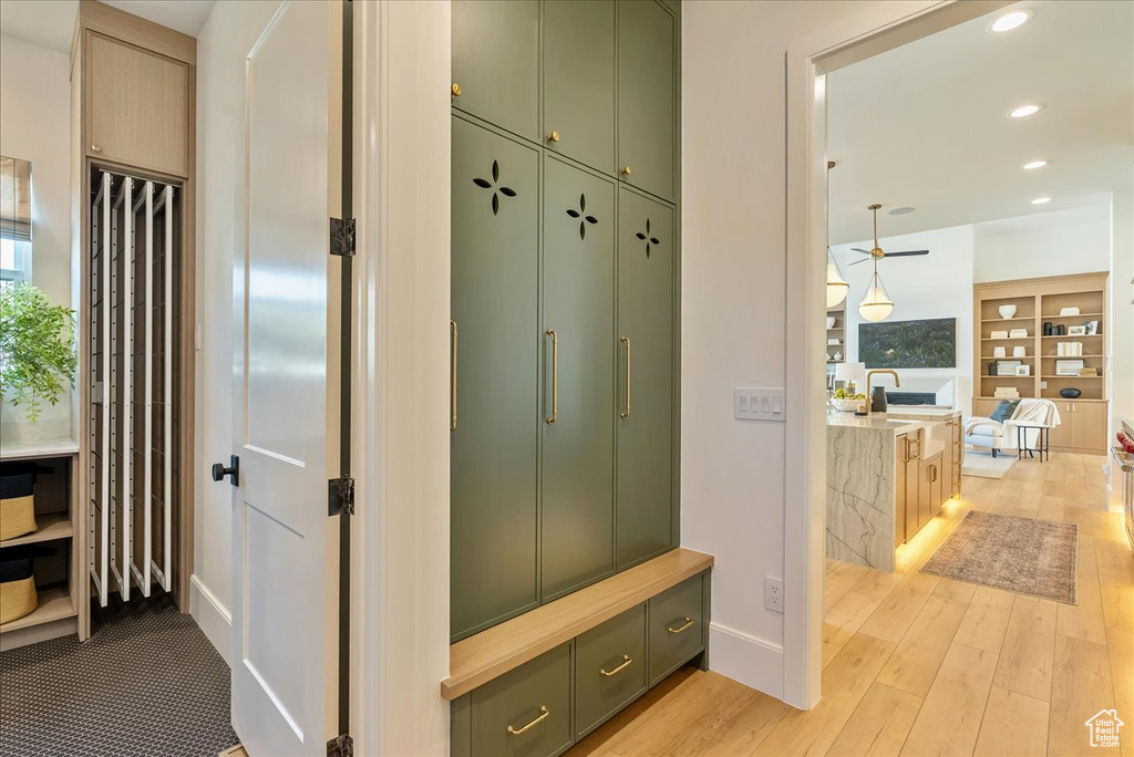 Mudroom featuring light wood-style floors, recessed lighting, baseboards, plenty of natural light, and a ceiling fan