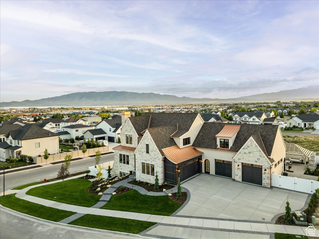 Aerial view of residential area with a mountain backdrop