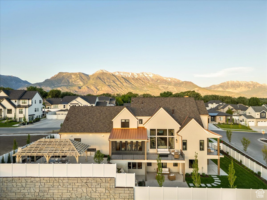 View of mountain backdrop with nearby suburban area