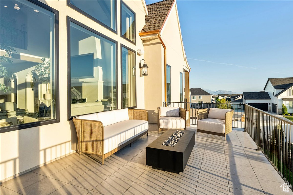 Deck with an outdoor living space and a residential view