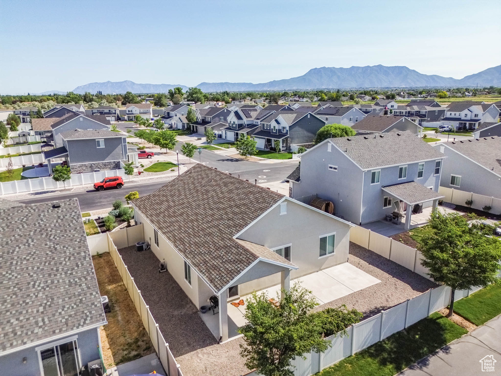 Aerial perspective of suburban area featuring mountains