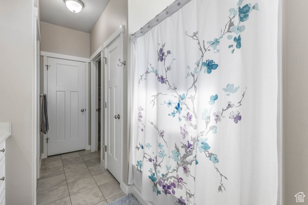 Full bath featuring vanity
