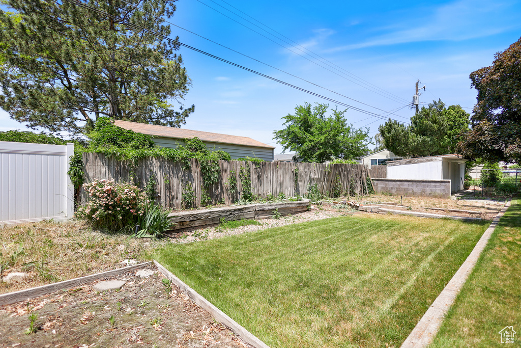 View of yard with a vegetable garden