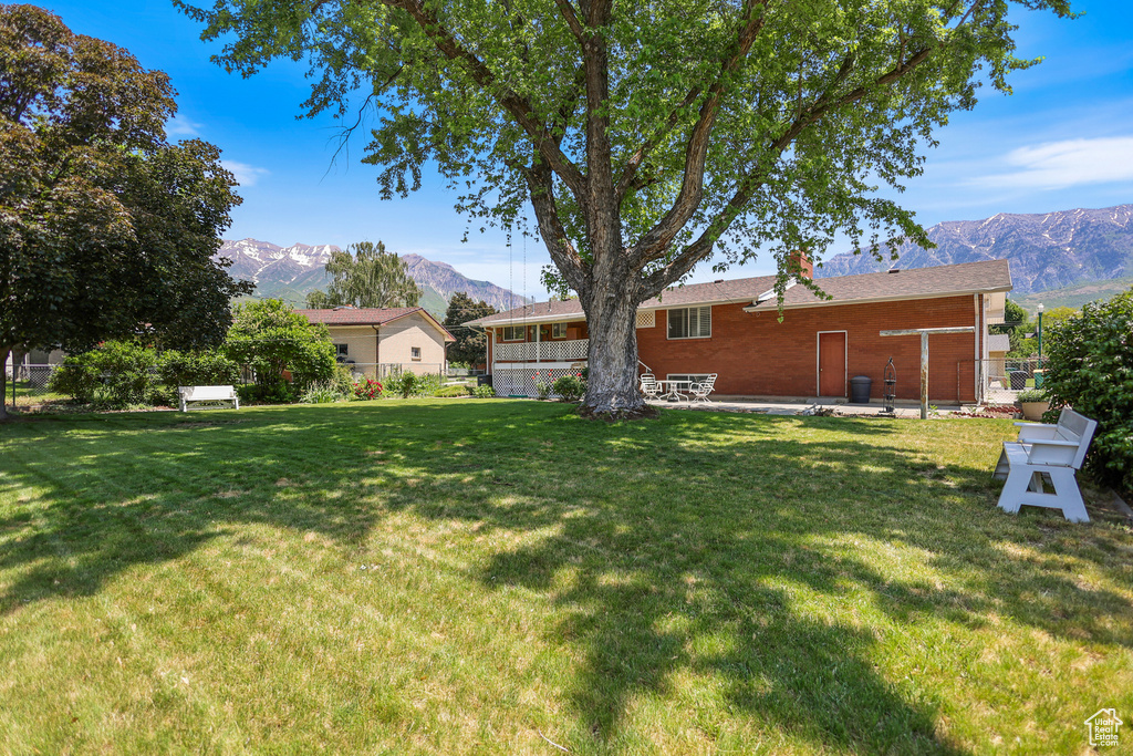 View of yard with a mountain view