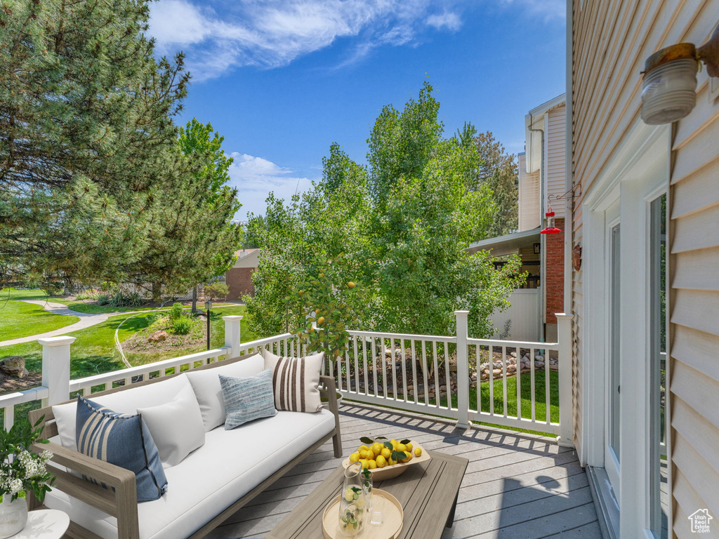 Wooden deck with an outdoor hangout area