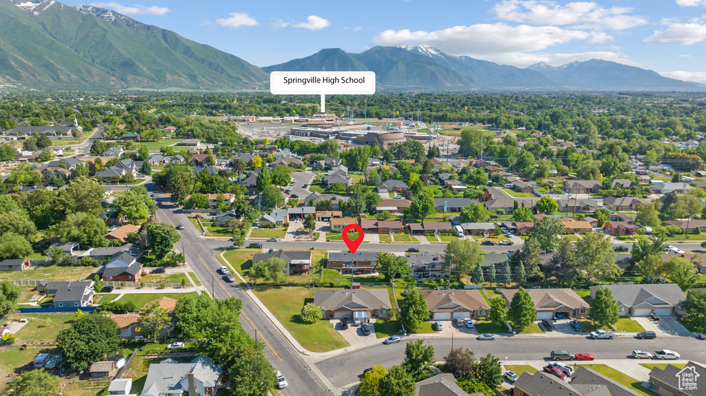 Aerial perspective of suburban area with mountains