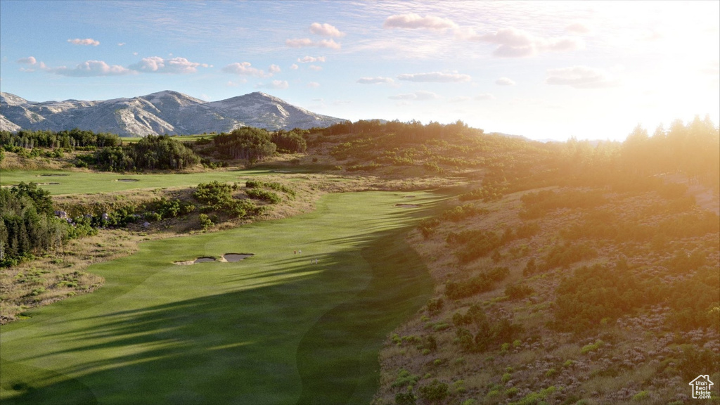Surrounding community with a mountain view and golf course view