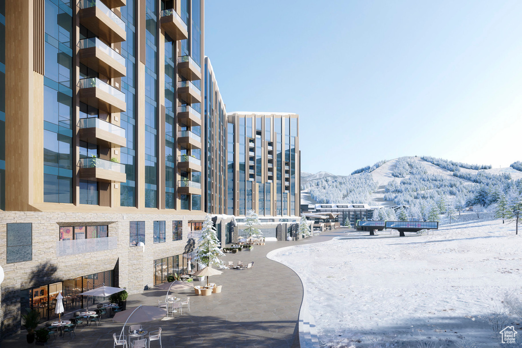 View of building exterior featuring a mountain view