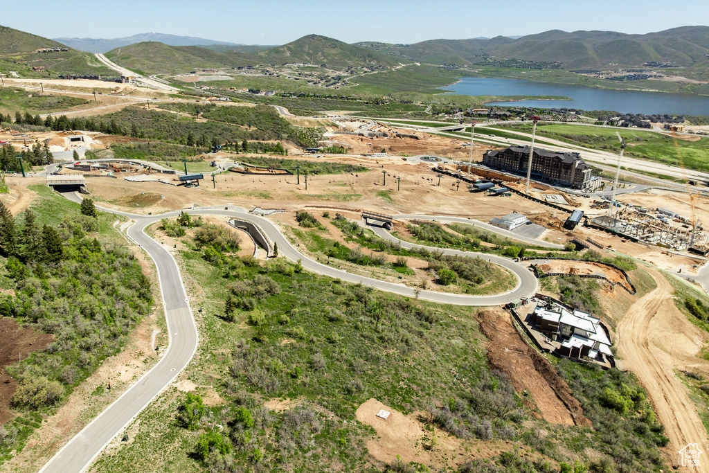 Aerial view of property\'s location with a water and mountain view