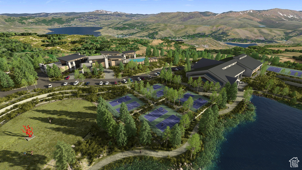 Aerial overview of property\'s location with a water and mountain view