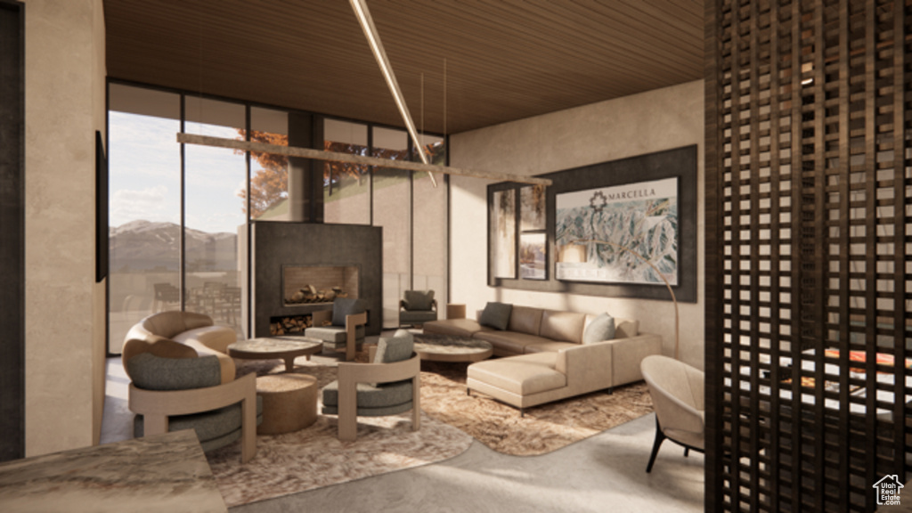 Building lobby with floor to ceiling windows, wood ceiling, and a mountain view