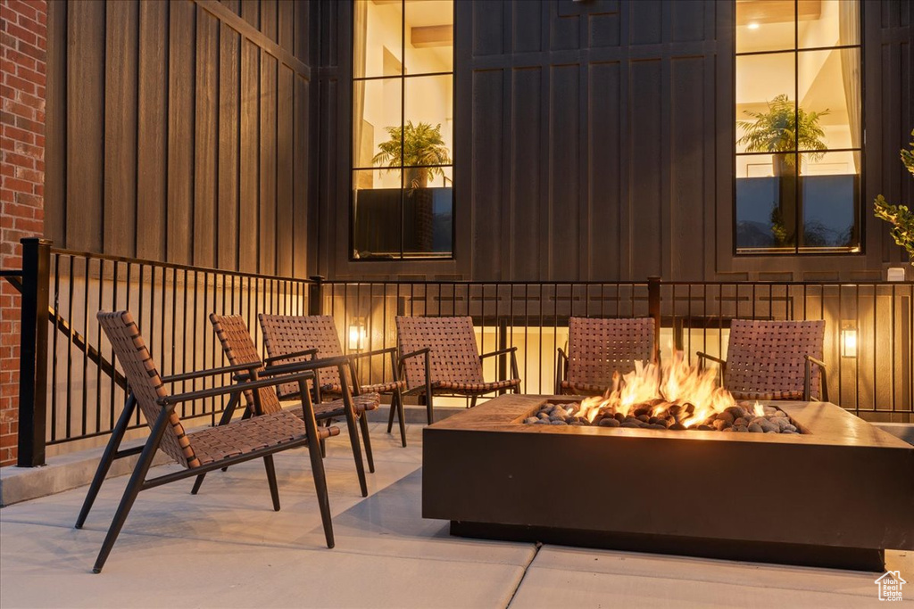 View of patio featuring an outdoor fire pit