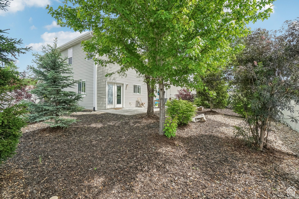 View of yard with a patio