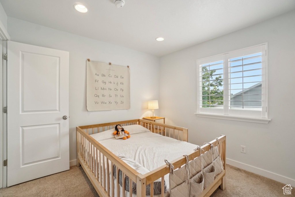 Bedroom featuring carpet floors, baseboards, and recessed lighting
