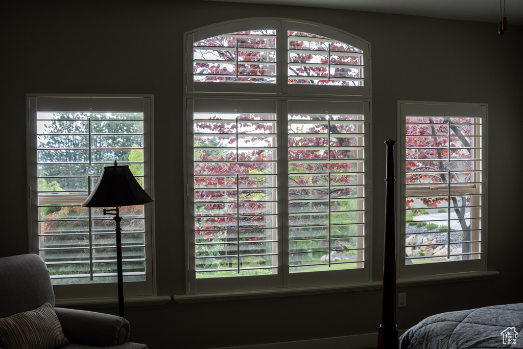 Bedroom featuring multiple windows