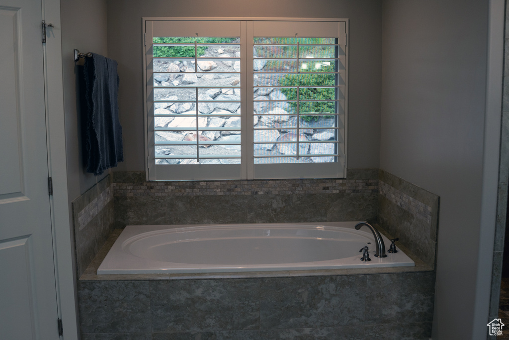 Full bath with a bath