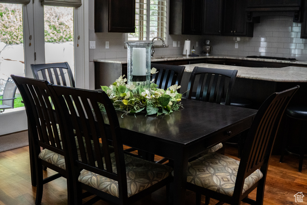 Dining area featuring wood finished floors
