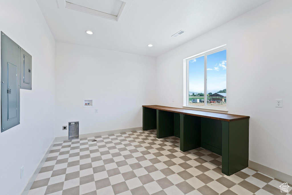 Washroom with washer hookup, electric dryer hookup, recessed lighting, electric panel, and attic access