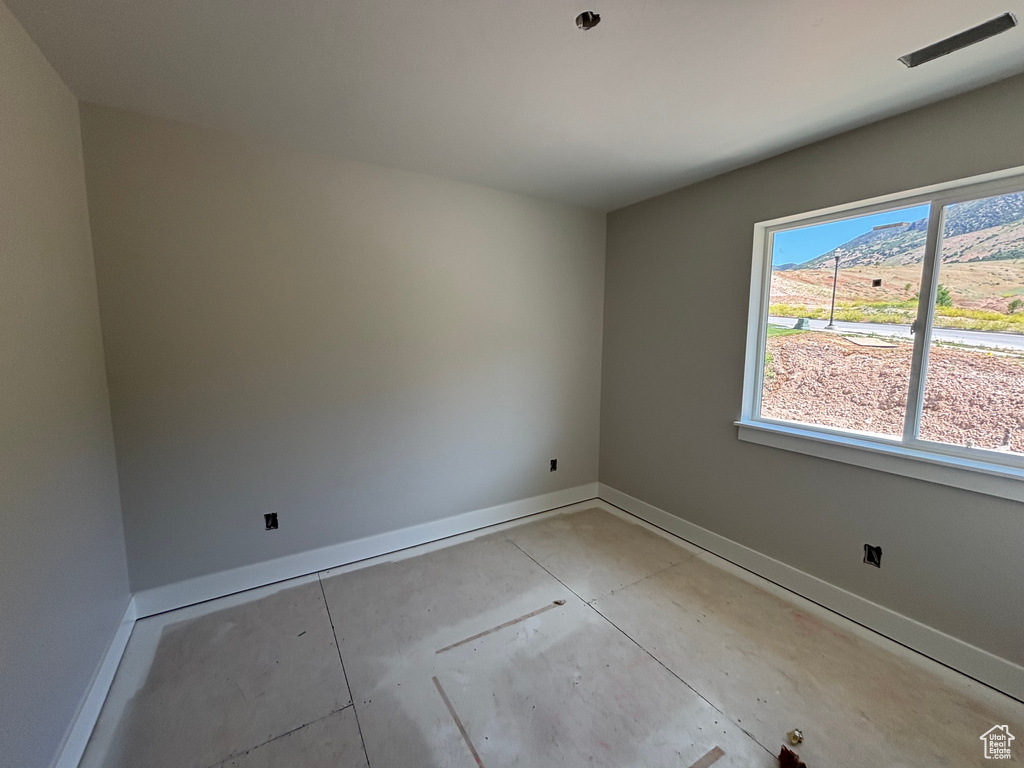 Empty room with baseboards