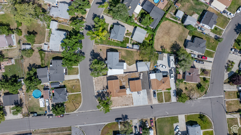 Aerial view of property\'s location featuring nearby suburban area