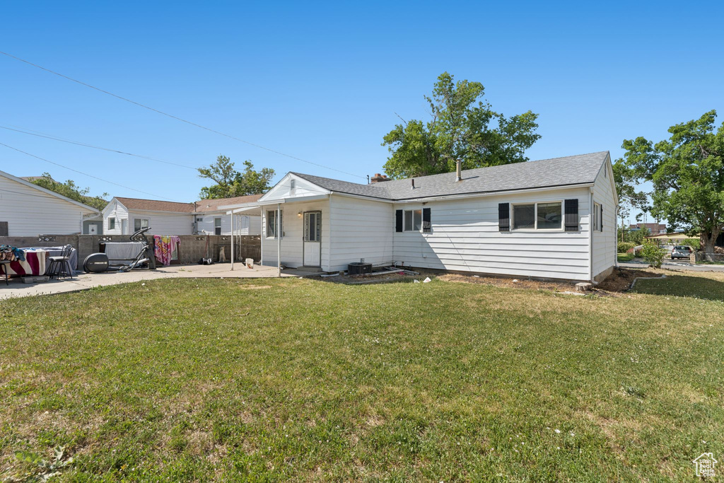 Back of property featuring a patio area