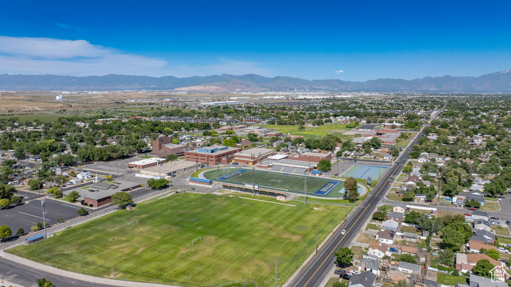 Aerial overview of property\'s location featuring a mountain backdrop