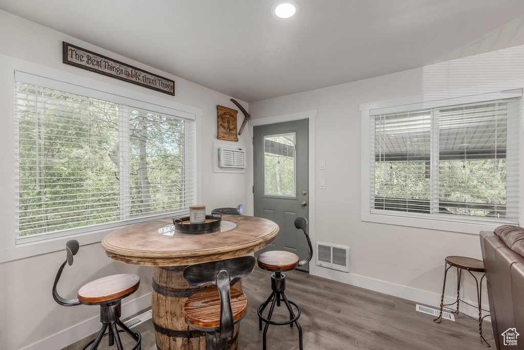 Dining room with baseboards and wood finished floors