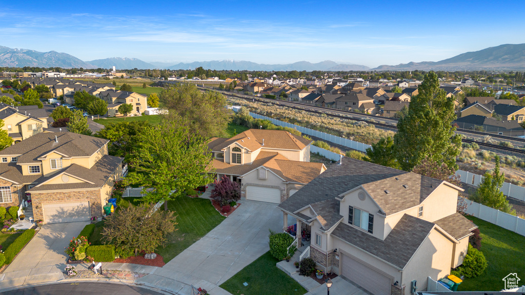 Aerial view of residential area with a mountain backdrop