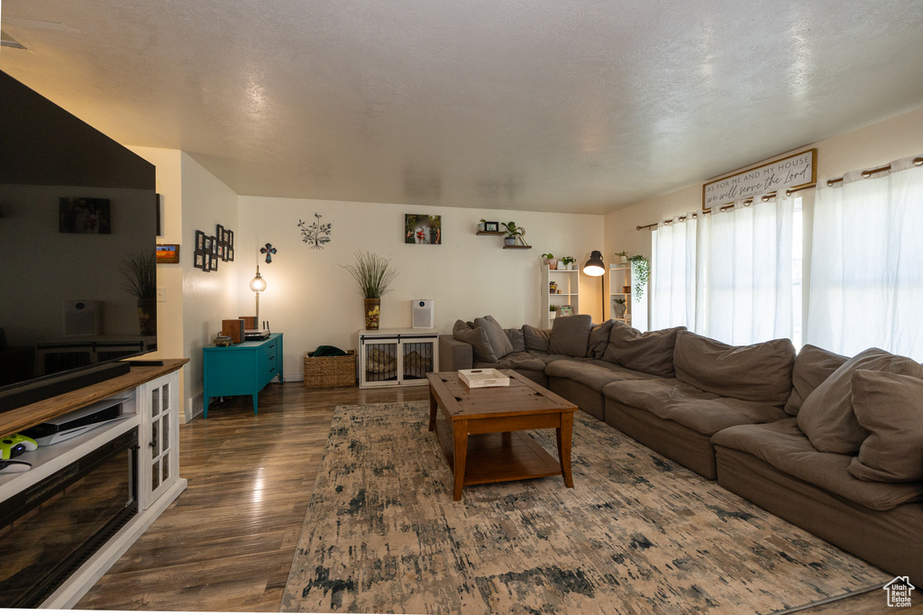 Living area featuring wood finished floors