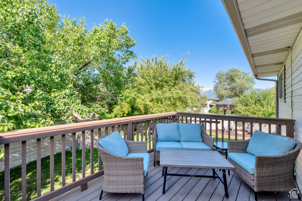 Deck with an outdoor living space
