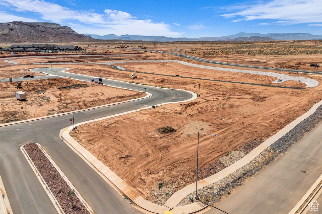 Drone / aerial view of mountains and a desert landscape