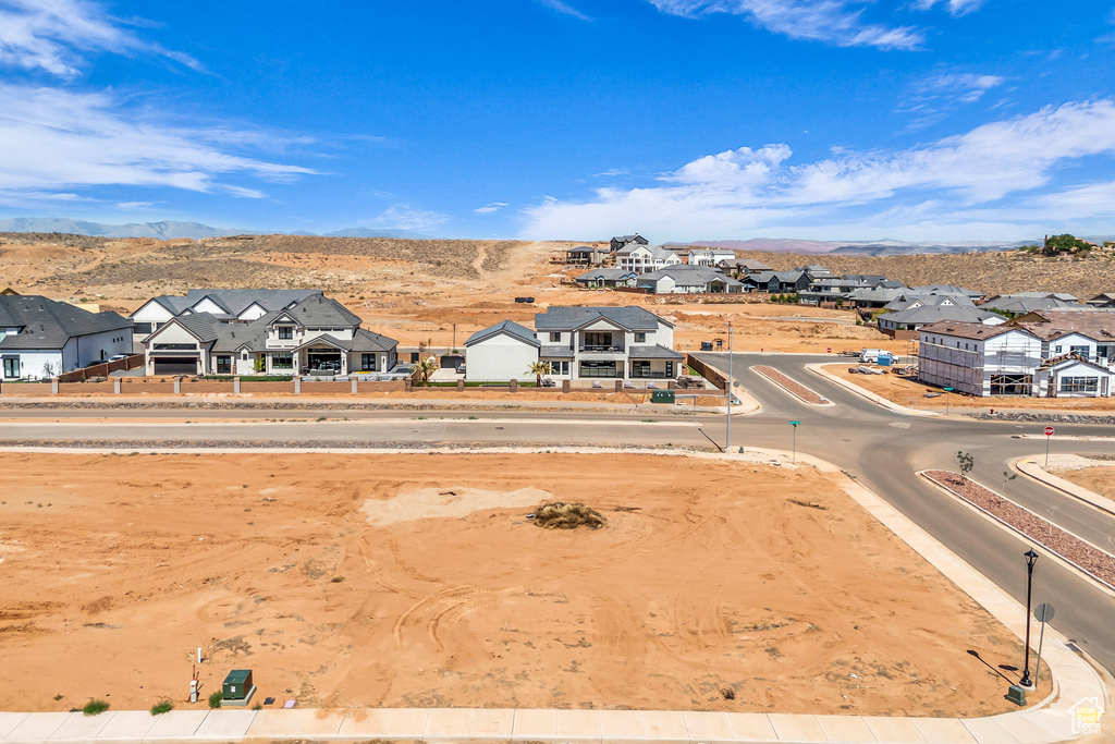 Aerial view of residential area with a mountain backdrop