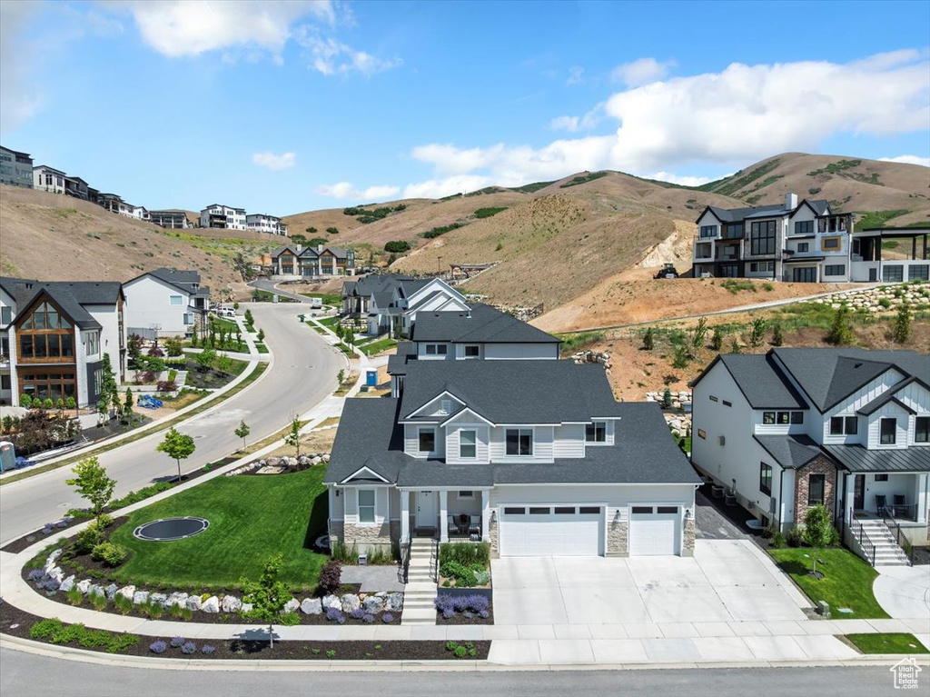 Aerial view of residential area with a mountain backdrop