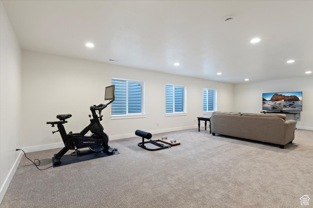 Exercise area with carpet flooring, recessed lighting, and baseboards