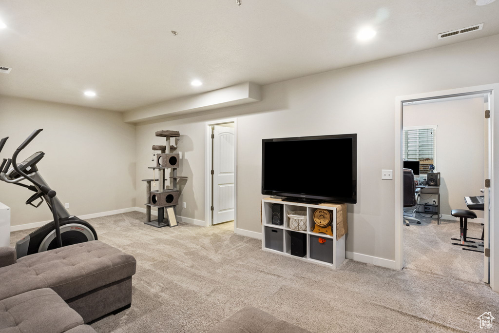 Workout room featuring recessed lighting, carpet flooring, and baseboards