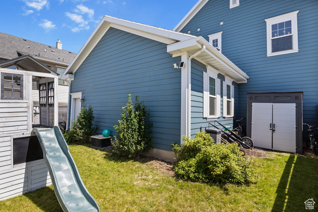 View of home's exterior featuring a yard