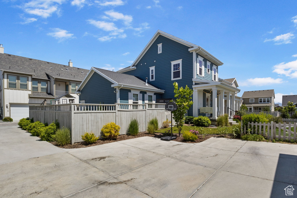 Back of property with a residential view