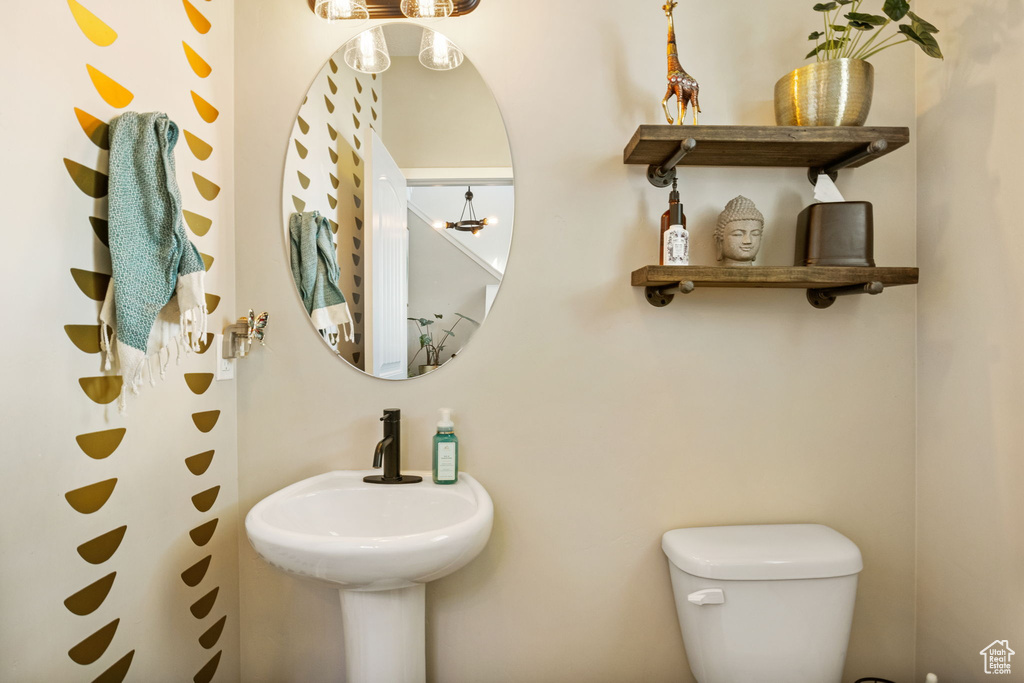 Half bath featuring toilet