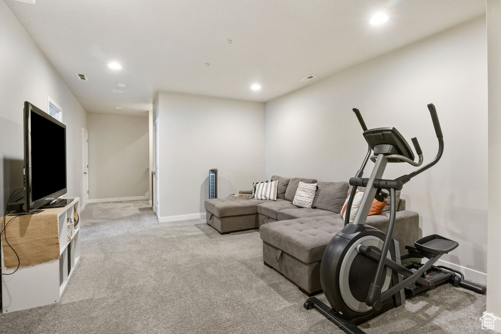 Exercise room featuring recessed lighting, carpet floors, and baseboards