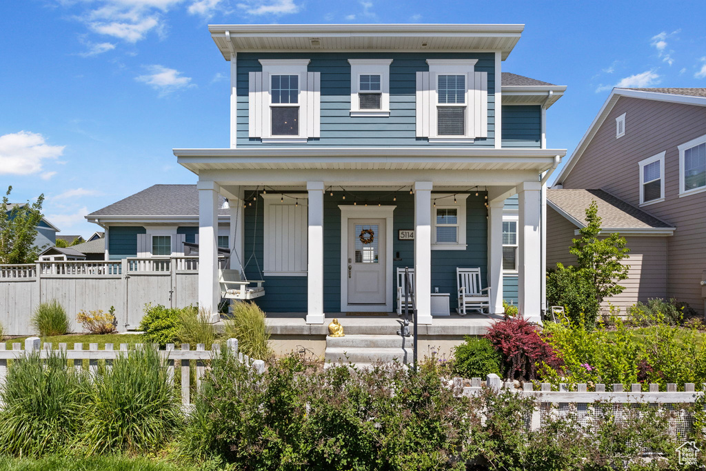View of front of home with covered porch