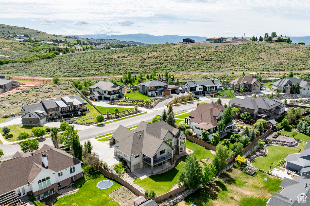 Aerial view of residential area with mountains