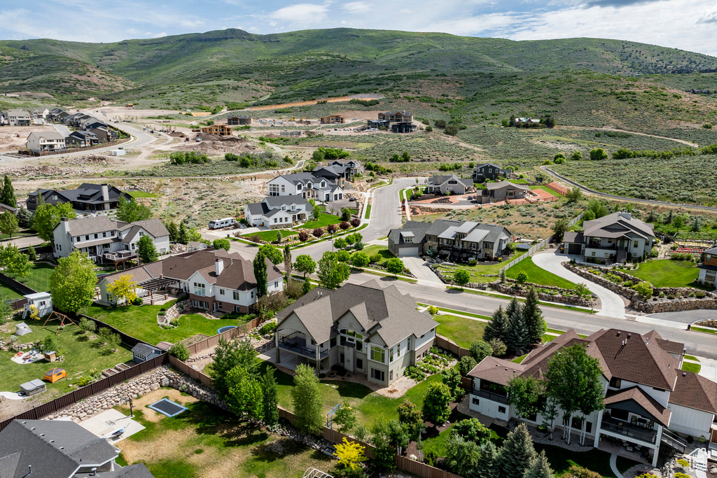 Aerial view of residential area with a mountain backdrop