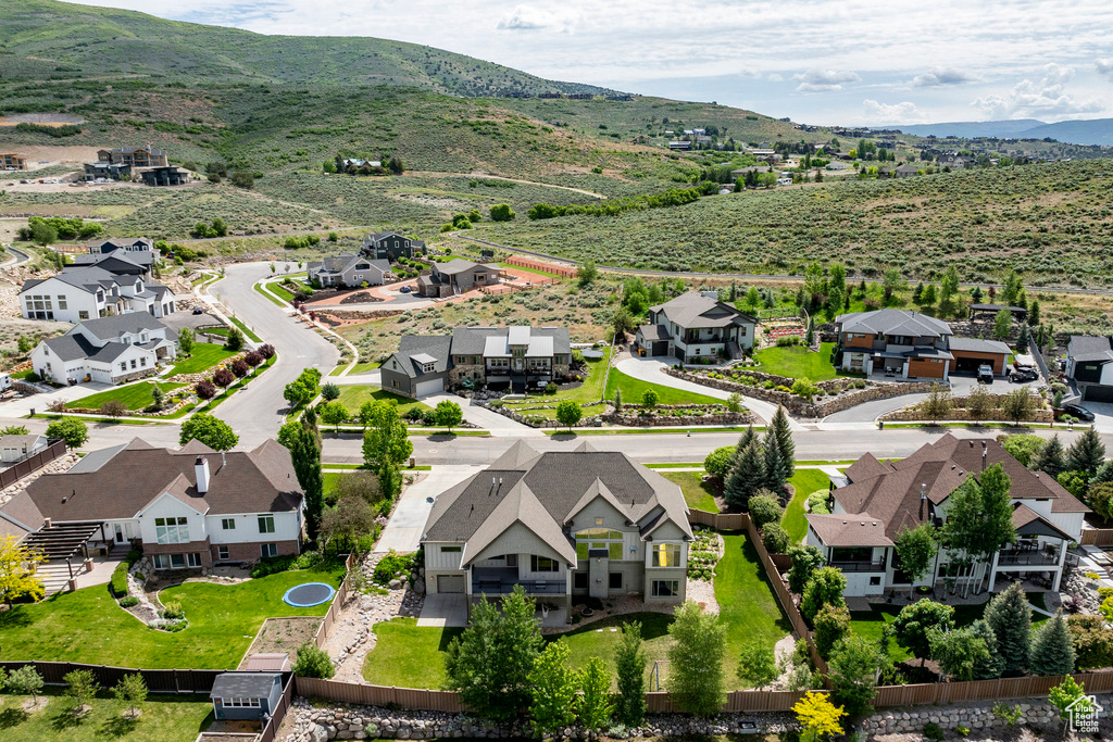 Aerial view of residential area with a mountain backdrop