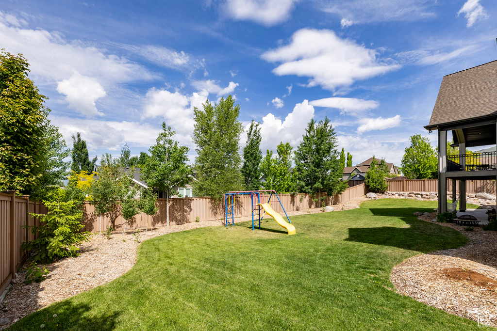 View of yard with a playground